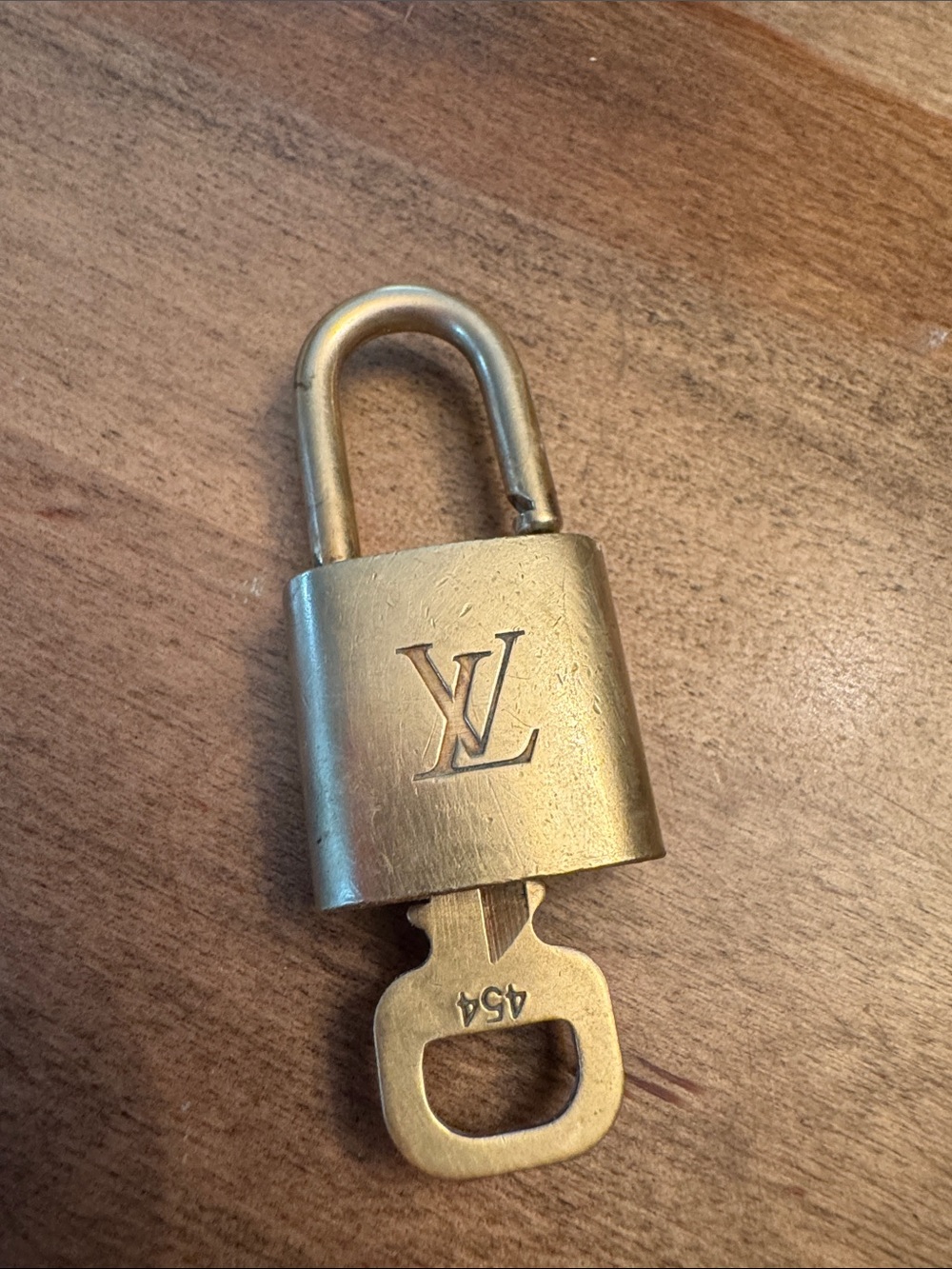 Louis Vuitton Gold Brass Padlock and Key Set